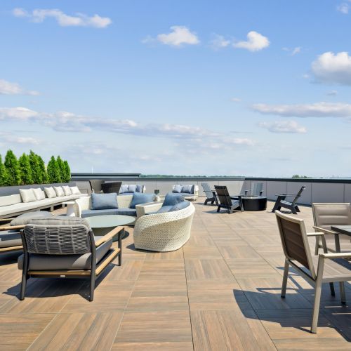 Amenities like Roof deck with grilling stations and firepit