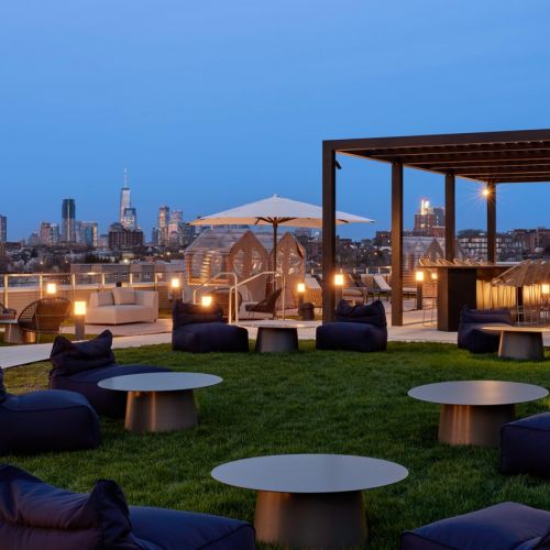 Rooftop seating with NYC skyline views