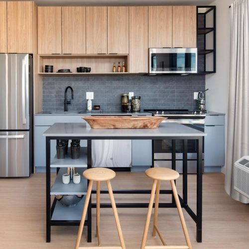 Kitchen with island and stainless steel appliances