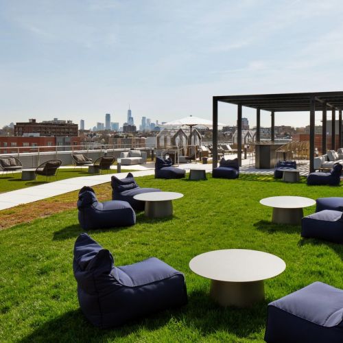 Rooftop seating with NYC skyline views