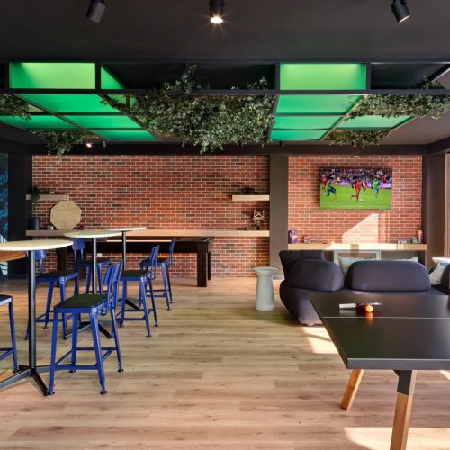 Game room with shuffleboard and ping pong table