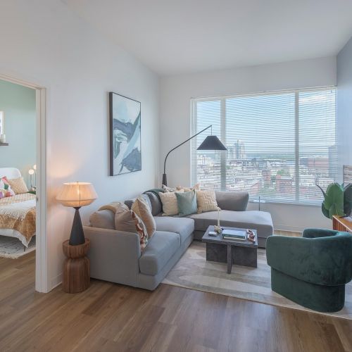 Living room with large windows and view.