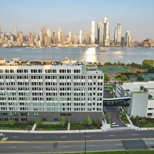 Exterior building with view of NYC skyline