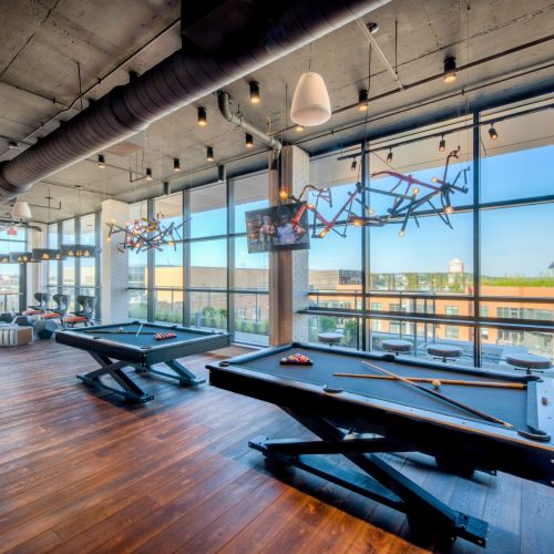 Photo of rooftop pool tables