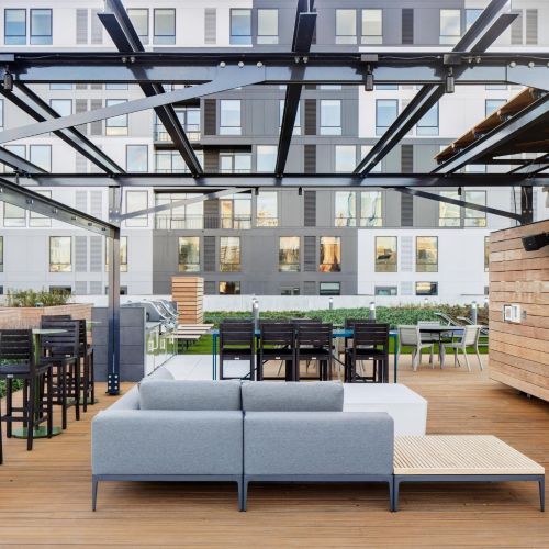 Covered rooftop TV and lounge area