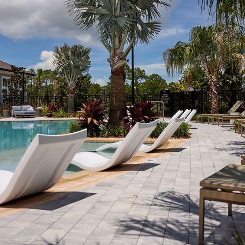 Resort-inspired pool with lounge chairs