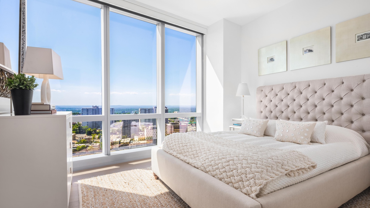 Bedroom with floor to ceiling windows