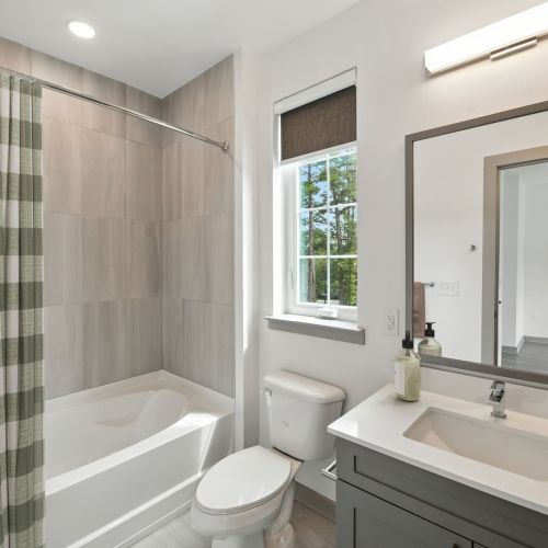 Quartz countertops and Walk-in showers*