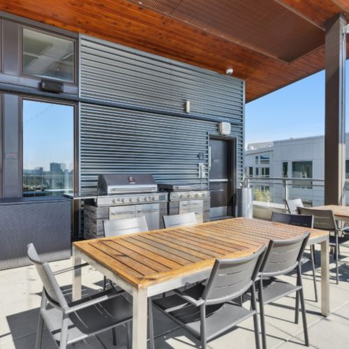 Rooftop barbecue and dining area at Eleanor in Seattle
