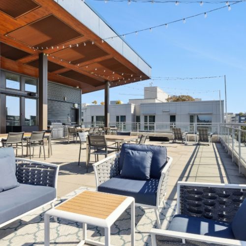 Outdoor rooftop seating and lounge at Eleanor in Seattle