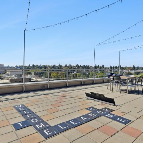Outdoor rooftop seating and lounge at Eleanor Seattle