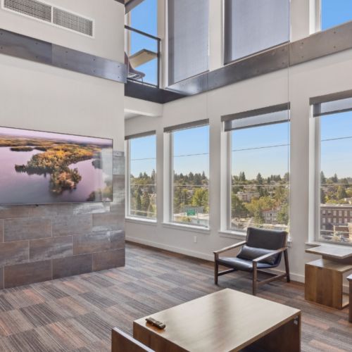 Community clubhouse seating area at Eleanor Apartments in Seattle