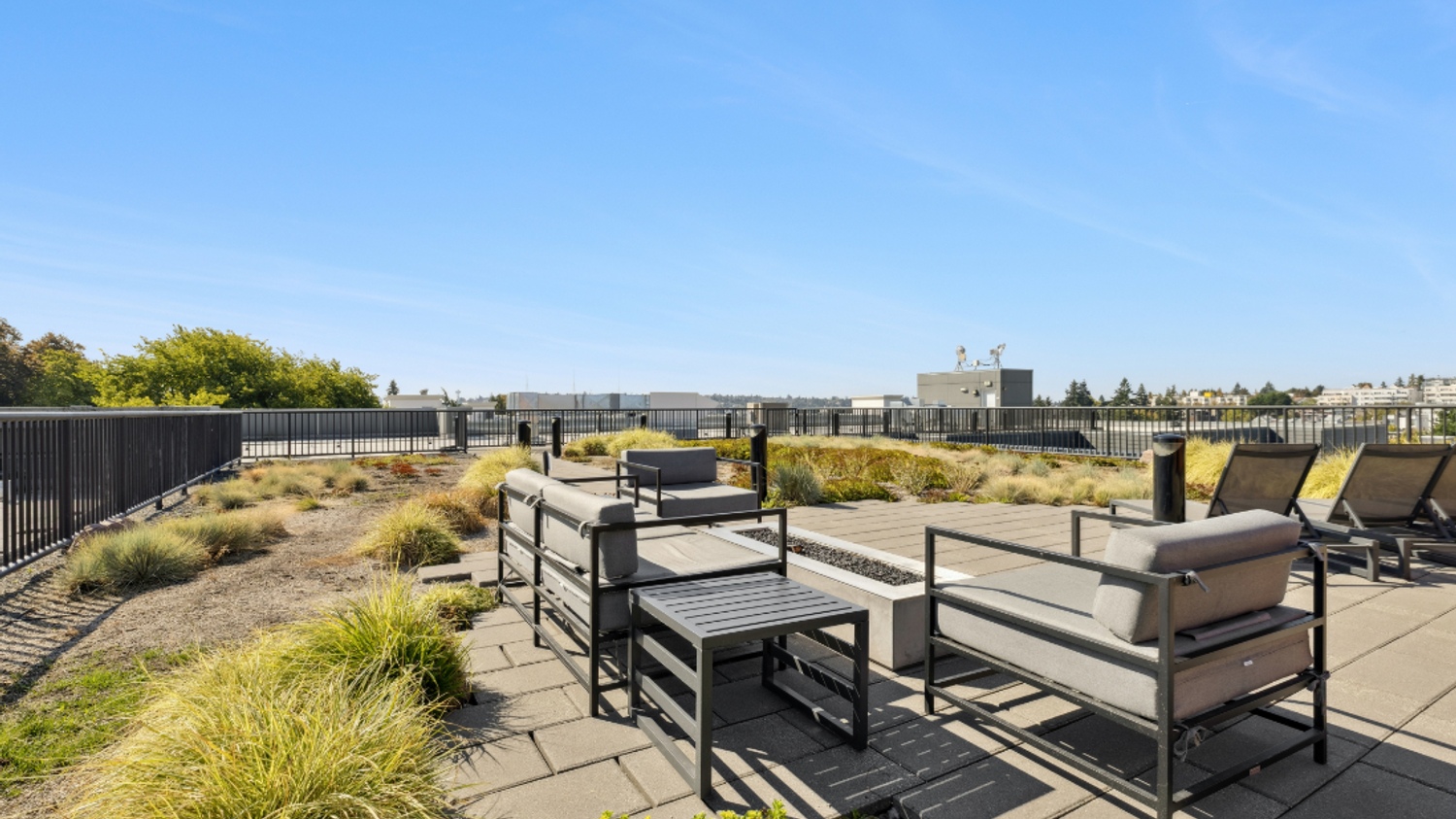 Rooftop firepit lounge at Smith & Burns Seattle with city views