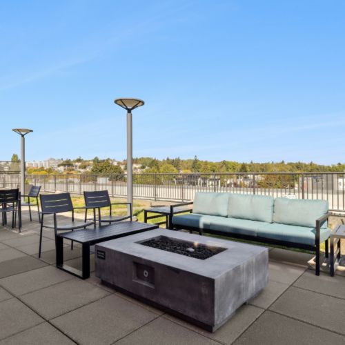 Smith & Burns apartment rooftop firepit seating area in Wallingford, Seattle