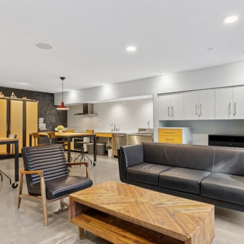 Resident amenity lounge with comfortable seating at Smith & Burns in Seattle