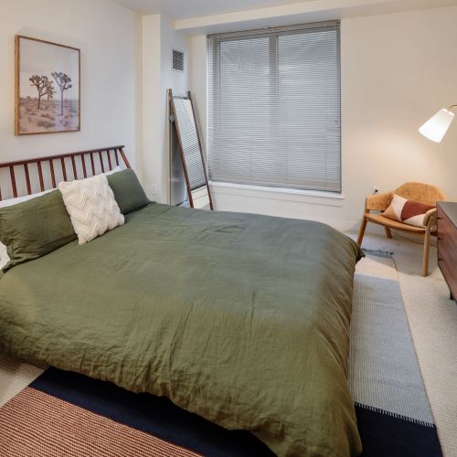 Retreat to a bedroom designed for serenity in the heart of the city.