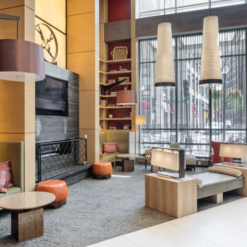 Fireplace lounge with plush seating.