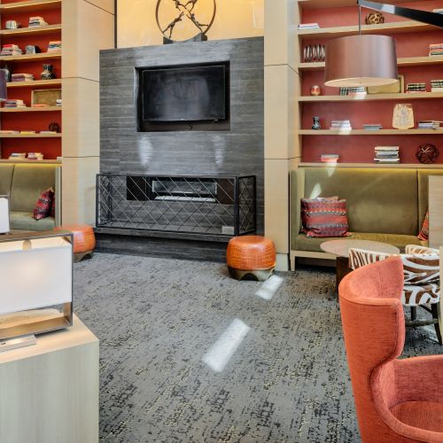 Close-up of fireplace and lounge seating.