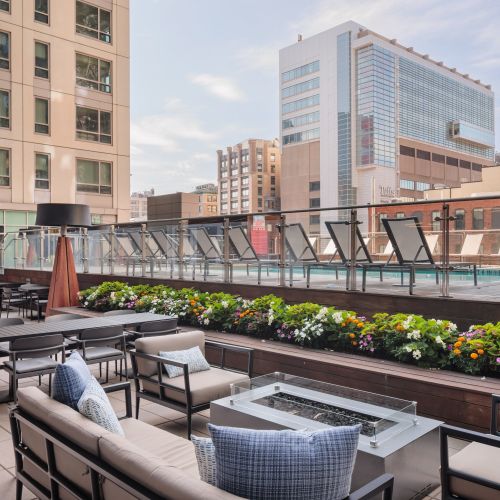 Cozy up by the fire with a skyline backdrop.