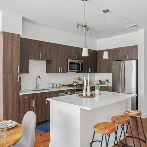 Kitchen Island featuring round dining table