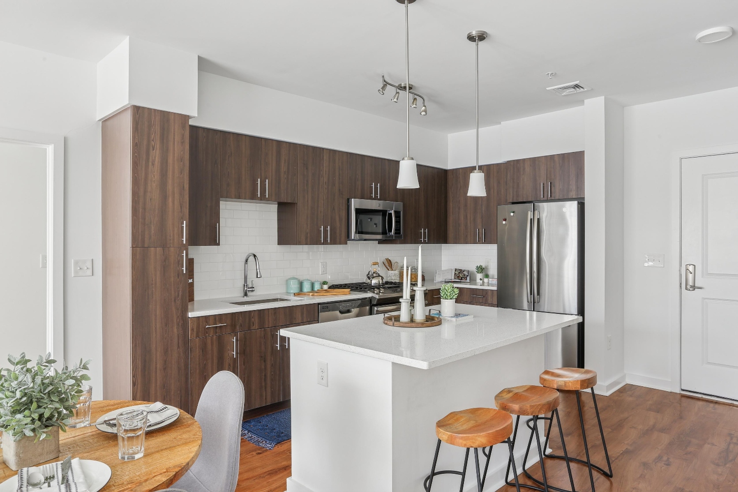 Kitchen Island featuring round dining table