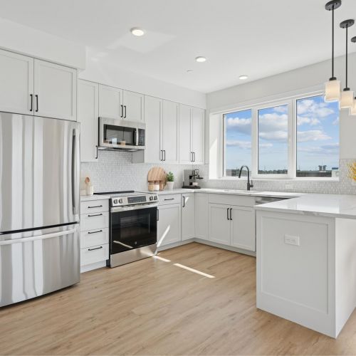 right, open-concept kitchen and living space