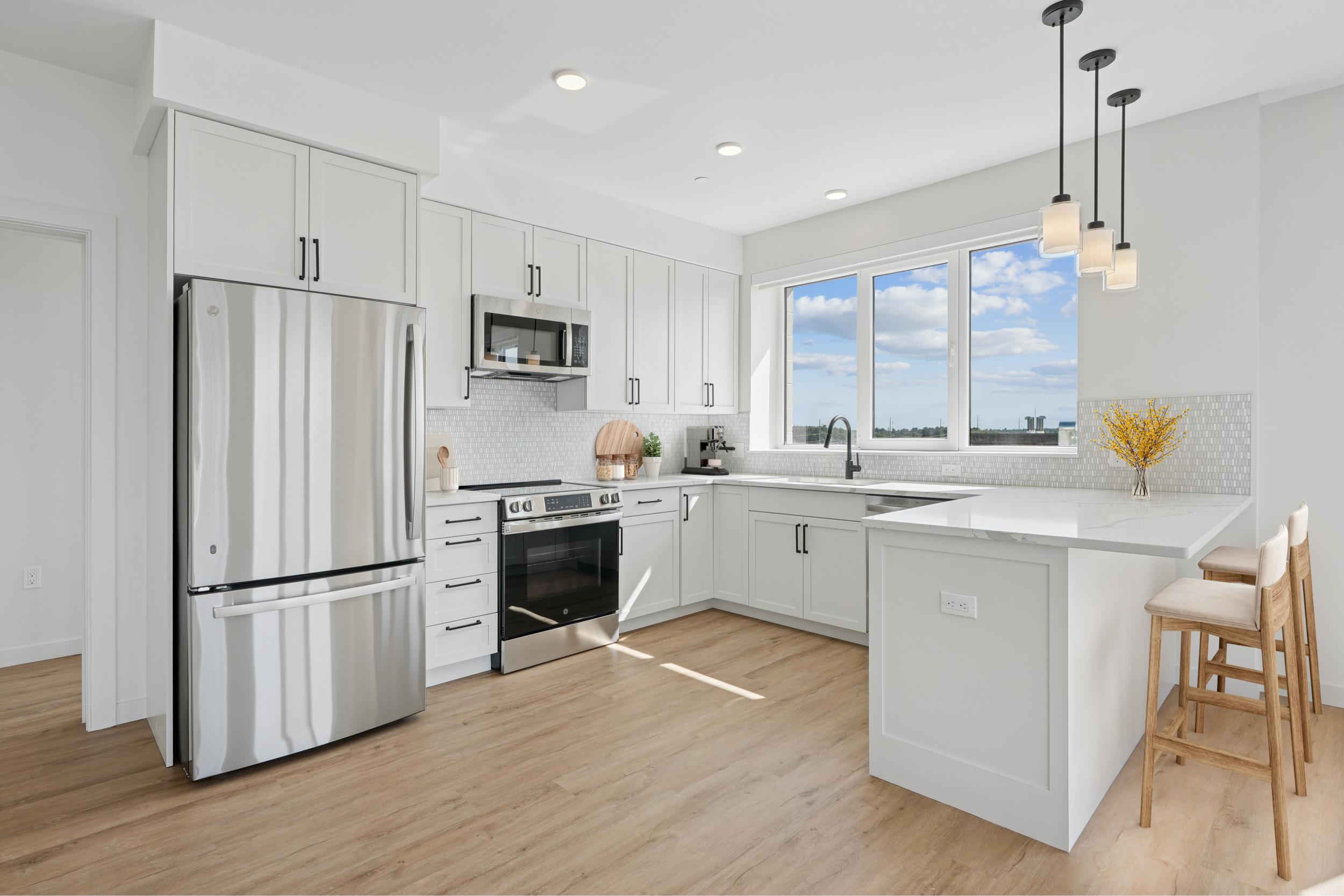 right, open-concept kitchen and living space