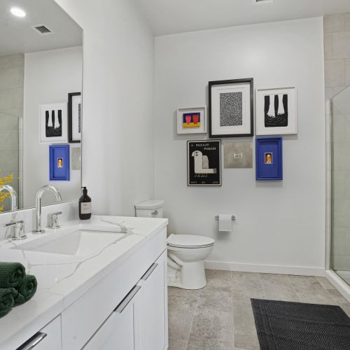 Calacatta Laza quartz countertops and modern cabinetry