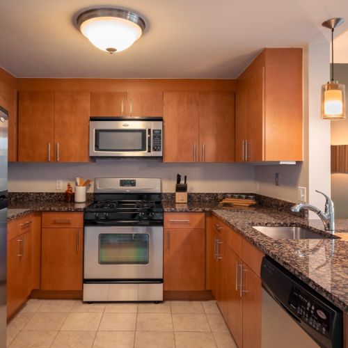 Kitchen with tile flooring and granite countertops