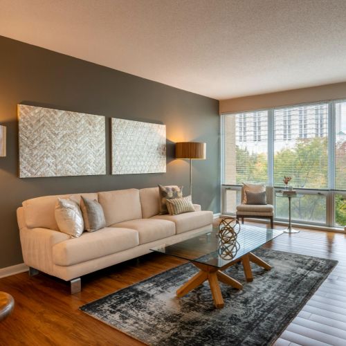 Living room with floor to ceiling windows