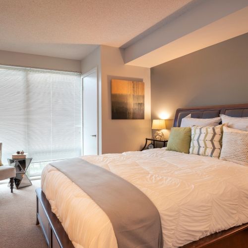 Bedroom with floor to ceiling windows