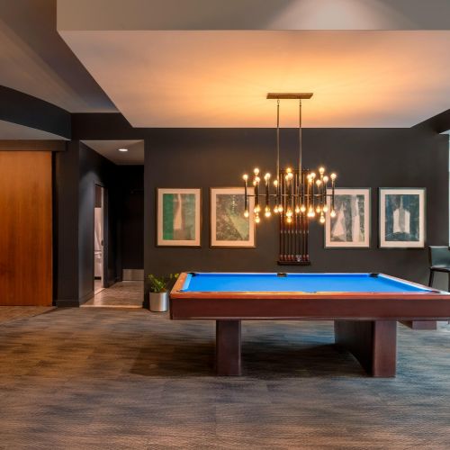 Clubroom with billiards and bar seating