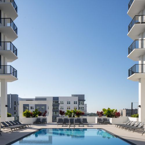 Pool with shaded cabanas and room to relax